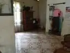 A land with house for sale